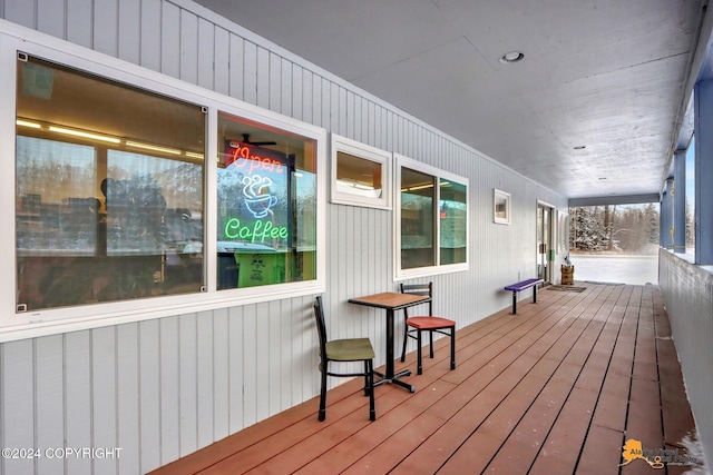 wooden terrace featuring a porch