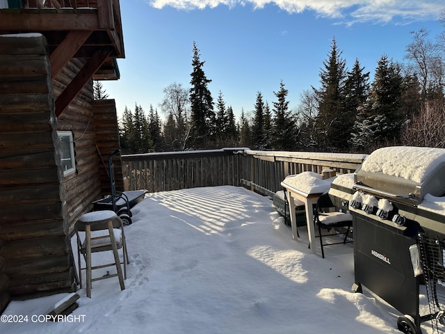 view of patio with grilling area and a deck