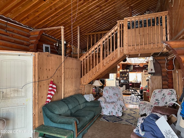 unfurnished living room with carpet floors, high vaulted ceiling, and wooden ceiling