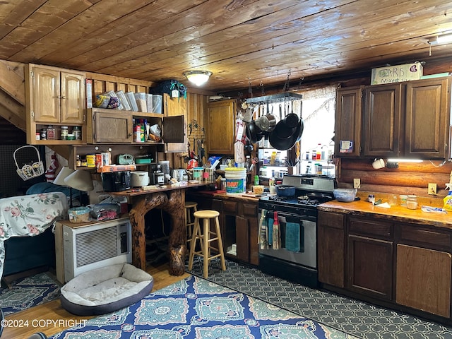 kitchen featuring black range with electric stovetop and wood ceiling