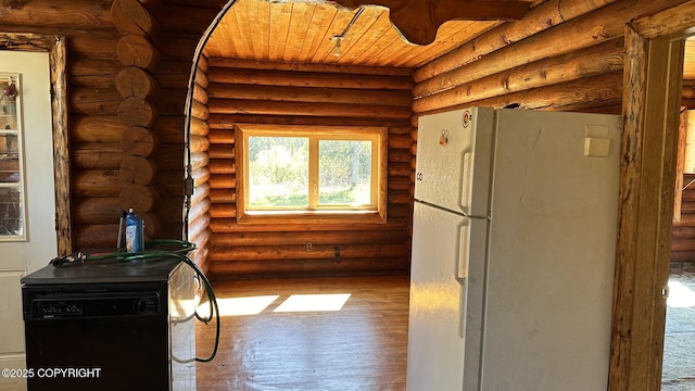 68537 Veater Ave, Ninilchik, AK 99639 - kitchen featuring freestanding refrigerator, log walls, wooden ceiling, and wood finished floors