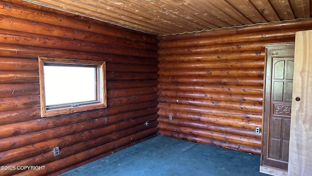 68537 Veater Ave, Ninilchik, AK 99639 - empty room featuring dark carpet and rustic walls