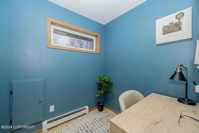 home office with light tile patterned floors and a baseboard heating unit