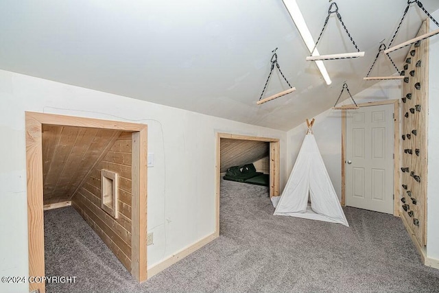 rec room with carpet flooring and lofted ceiling