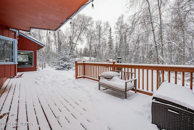 view of snow covered deck