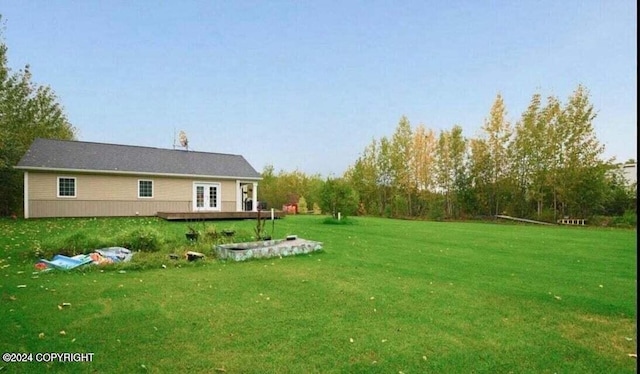 view of yard featuring french doors