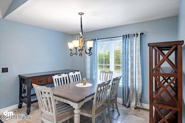 dining room with an inviting chandelier