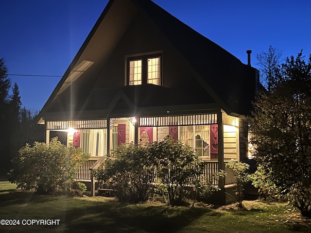 38400 Robinson Loop Rd, Sterling, AK 99672 - view of back of house at night