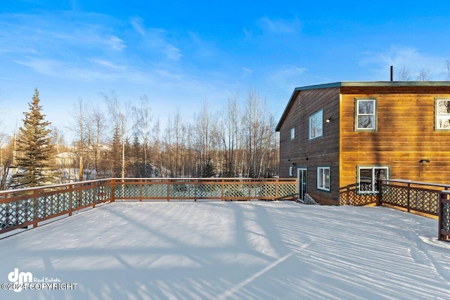 view of snow covered deck