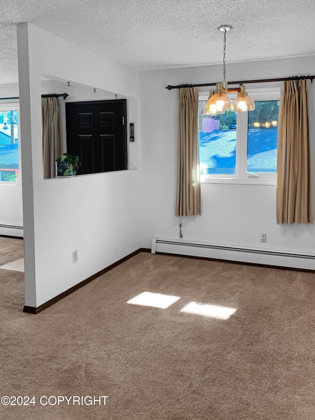 unfurnished dining area featuring carpet flooring, a textured ceiling, an inviting chandelier, and baseboard heating