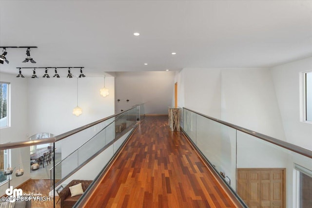 hall with dark hardwood / wood-style floors