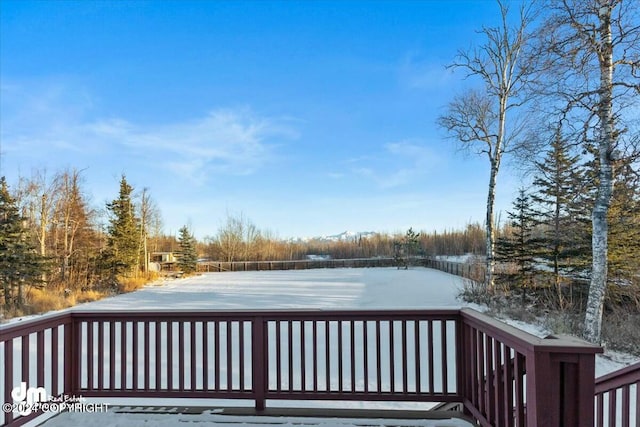 view of snow covered deck