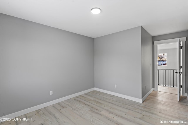 unfurnished room featuring light hardwood / wood-style flooring