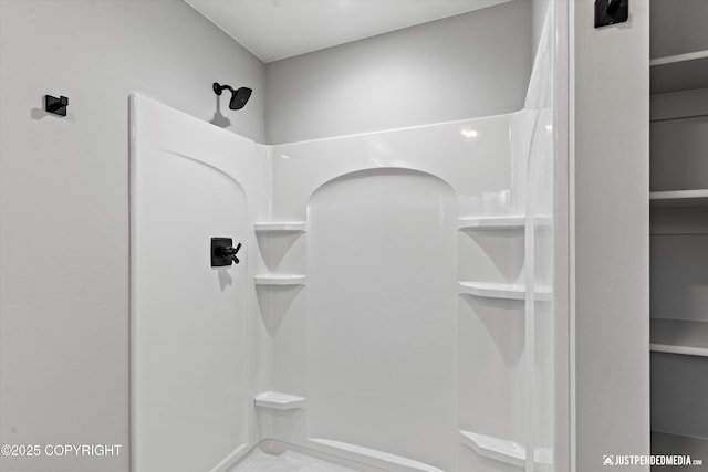 bathroom featuring walk in shower