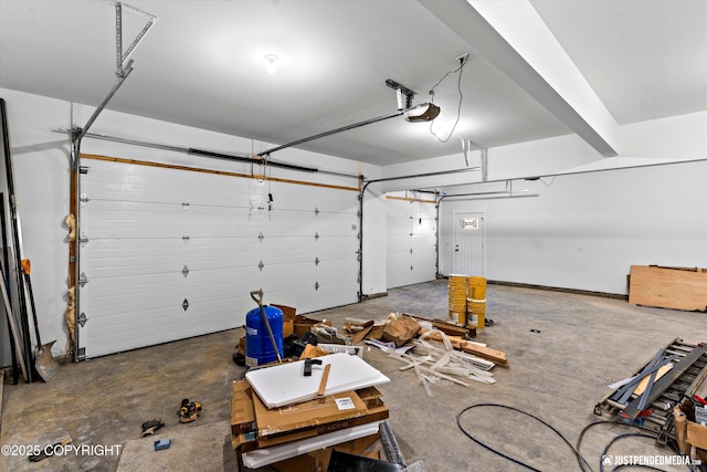 garage featuring a garage door opener