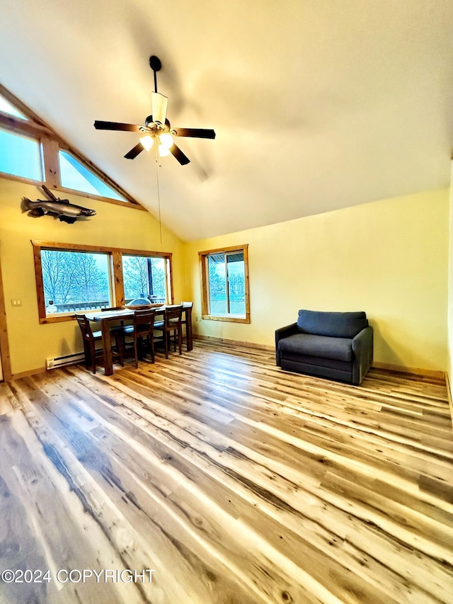 210A, 210B Brownell St, Seward, AK 99664 - interior space featuring ceiling fan, light wood-type flooring, and lofted ceiling