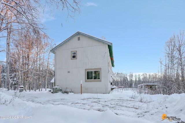 view of snow covered property