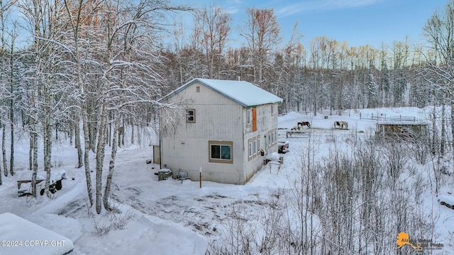 view of snow covered property