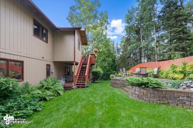 view of yard with a wooden deck