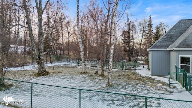 view of yard covered in snow