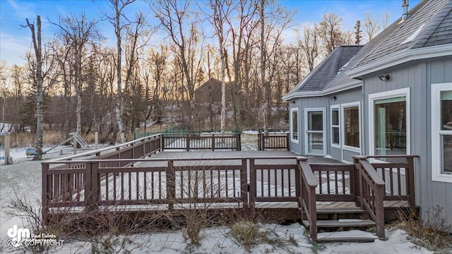 view of snow covered deck