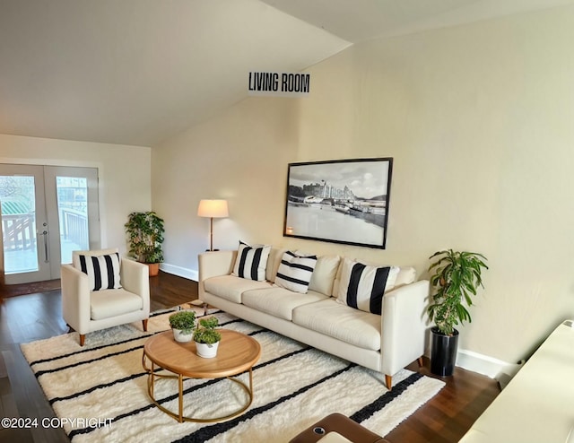 living room with french doors, dark hardwood / wood-style floors, and lofted ceiling