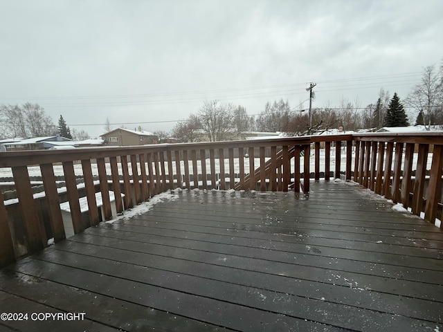 view of snow covered deck