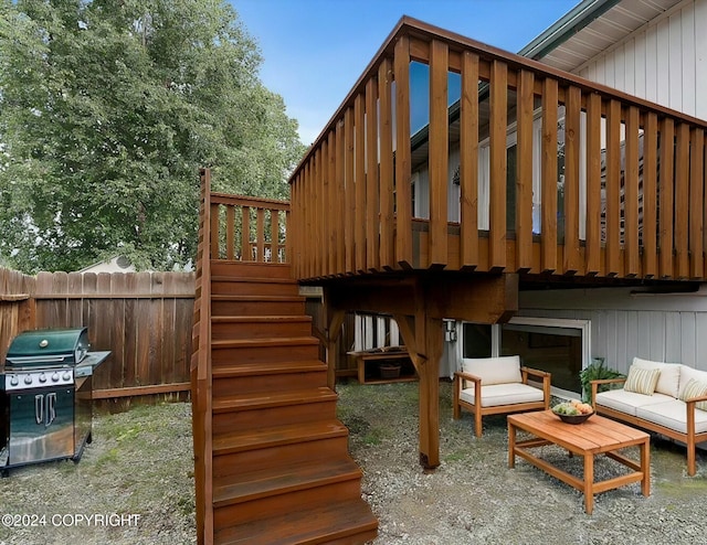 deck featuring an outdoor hangout area and area for grilling