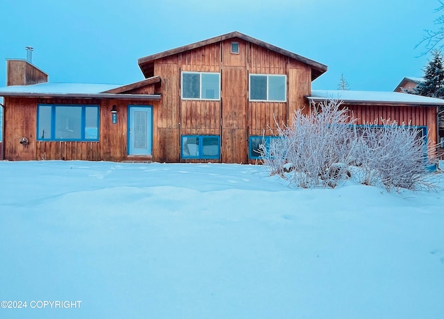 view of snow covered property