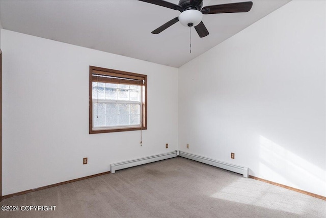 carpeted spare room with a baseboard radiator, vaulted ceiling, and ceiling fan