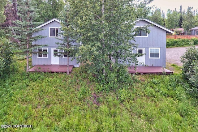 rear view of house with a deck