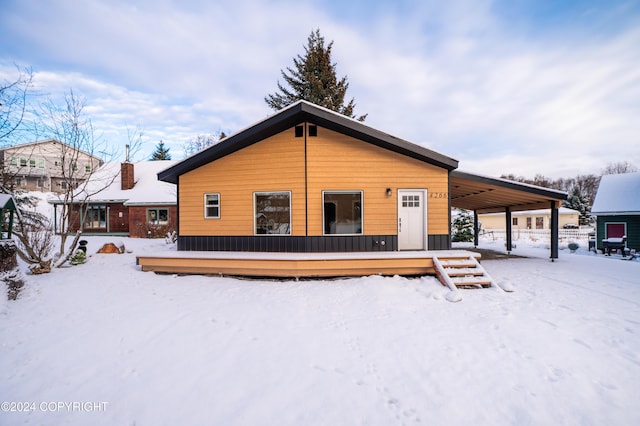 view of front of home featuring a carport