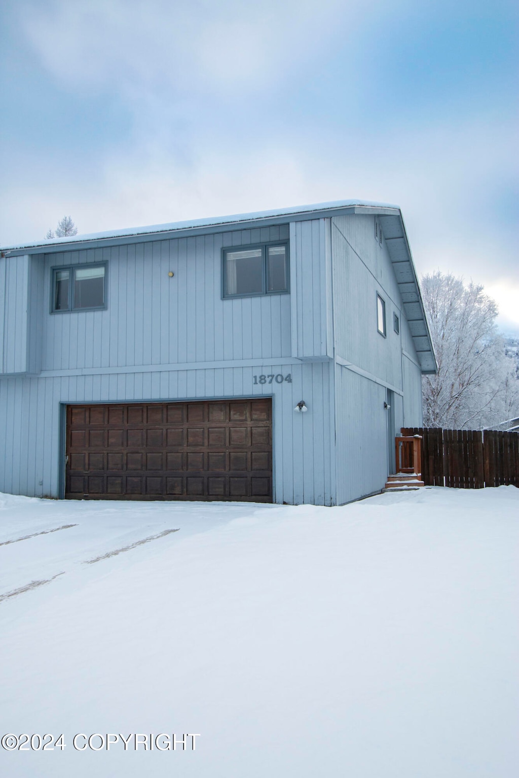 exterior space with a garage