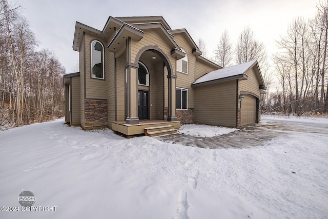 view of front of property featuring a garage