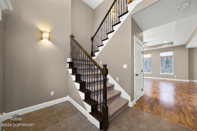 stairway featuring hardwood / wood-style floors