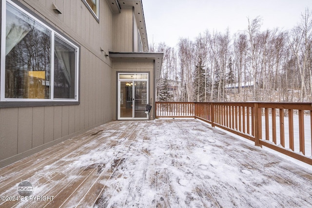 view of snow covered deck