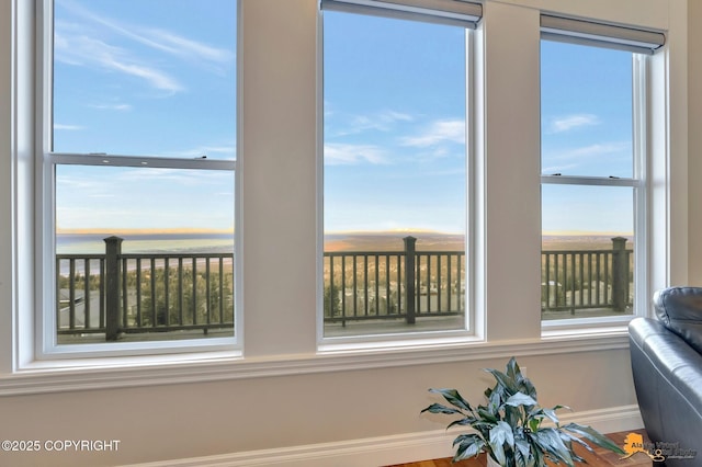 unfurnished sunroom featuring a wealth of natural light