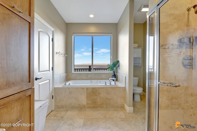 bathroom featuring toilet, a shower stall, and a bath