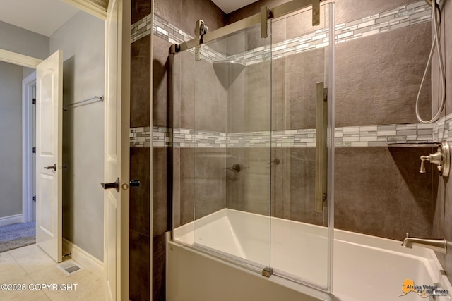 bathroom featuring baseboards and tile patterned floors