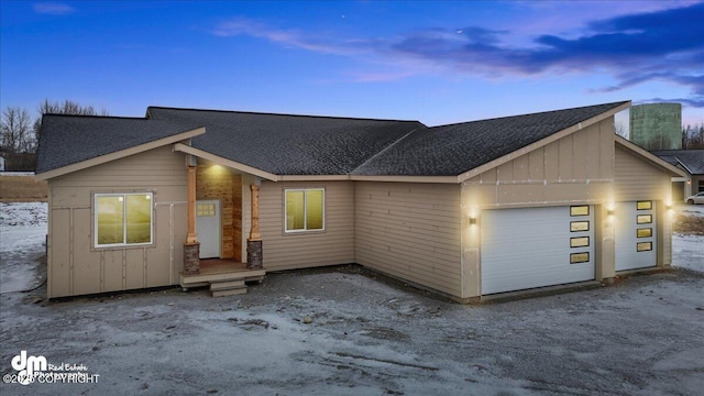 view of front of property featuring a garage