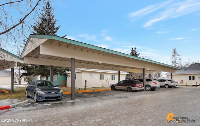 view of car parking featuring a carport