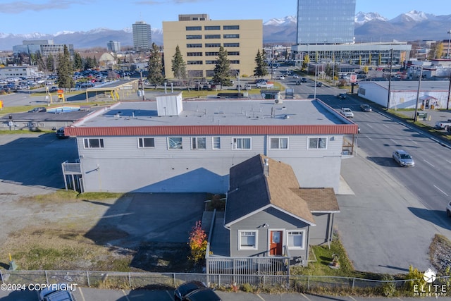 drone / aerial view featuring a mountain view