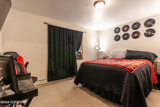 carpeted bedroom with ornamental molding