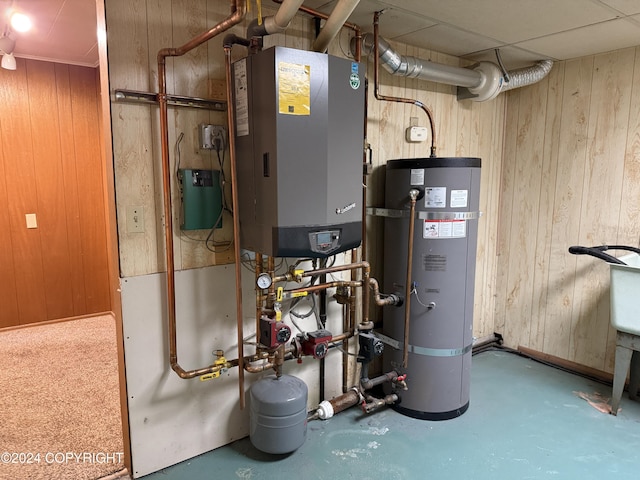 utility room featuring secured water heater