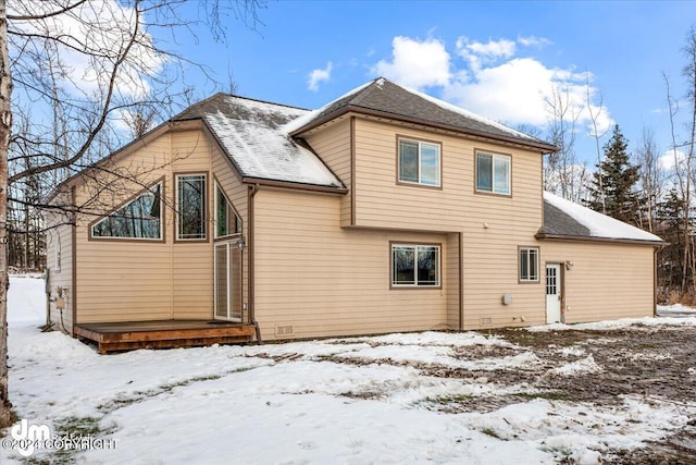 view of snow covered property