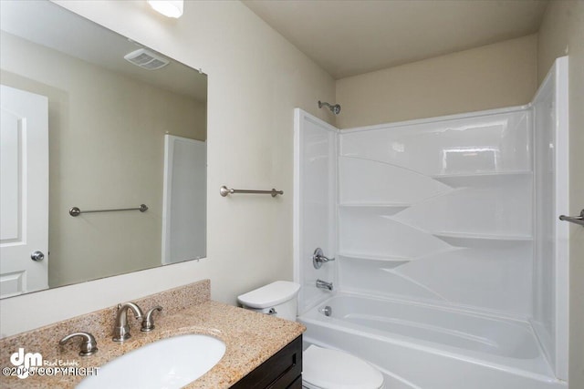 full bathroom featuring vanity, toilet, and shower / bath combination