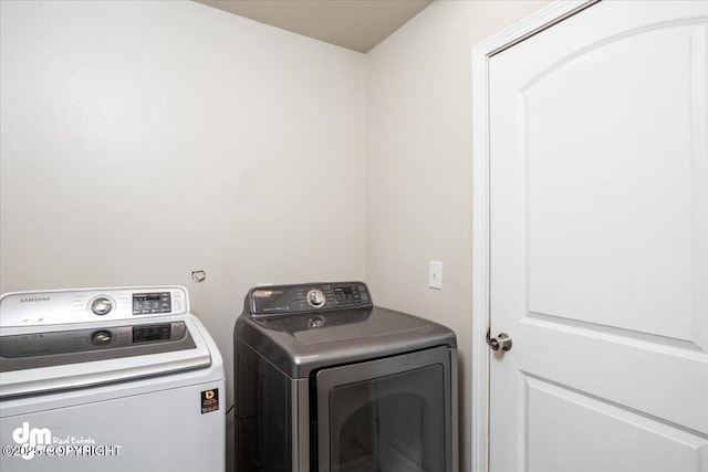 laundry area featuring separate washer and dryer