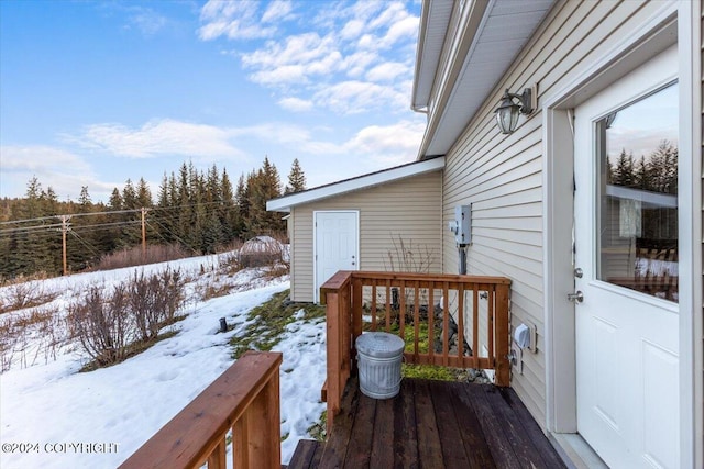 view of snow covered deck