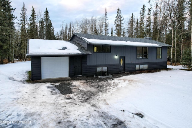 view of front of property featuring a garage