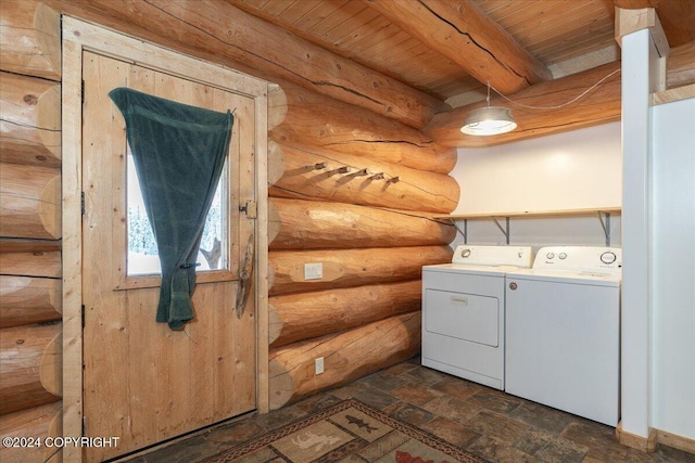 TL-215 Old Valdez Trl, Salcha, AK 99714 - laundry area with washing machine and dryer, rustic walls, wood ceiling, and dark stone finish flooring